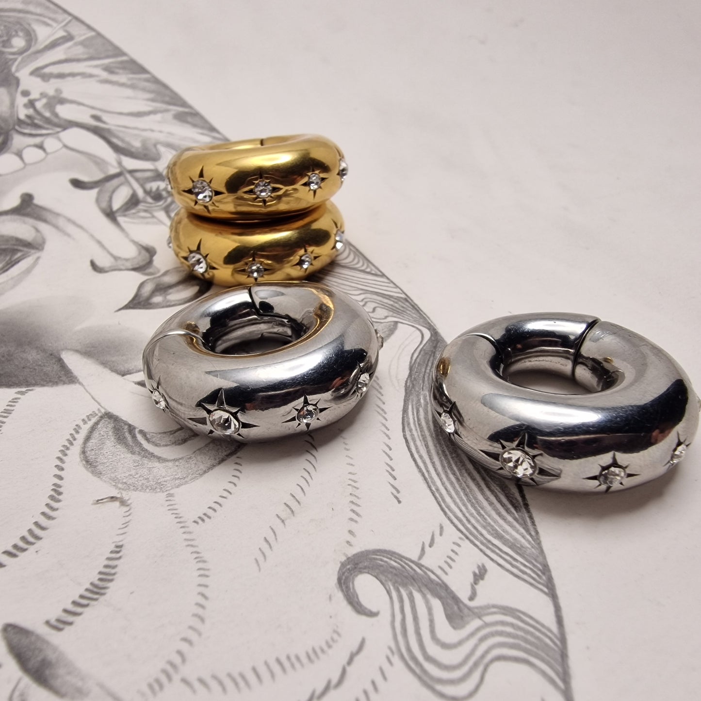 8MM 0G Silver Star Gaze Huggies