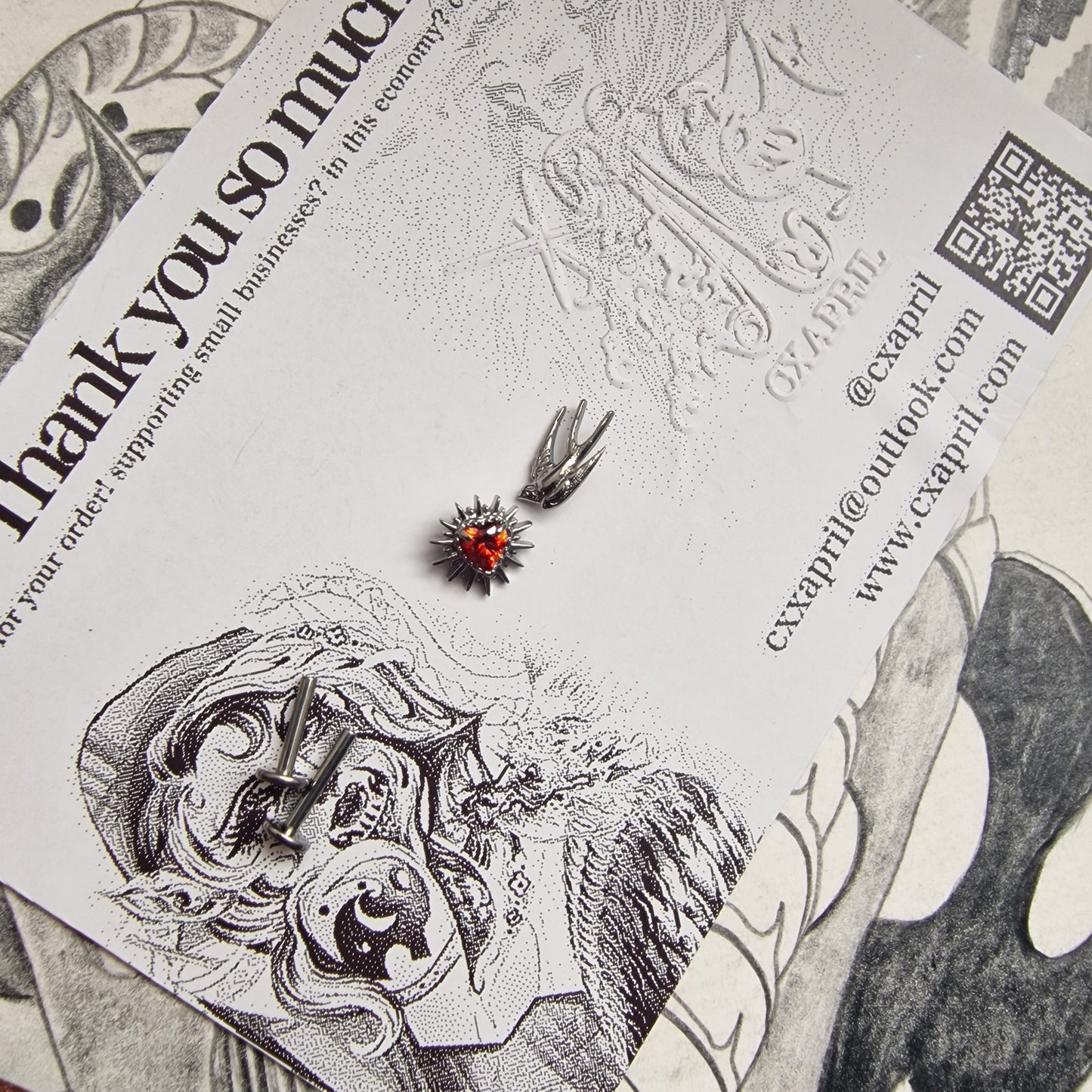 Don't shoot the messenger | Asymmetric Titanium Silver Bird Earring and Red Zircon Cartilage Stud Set