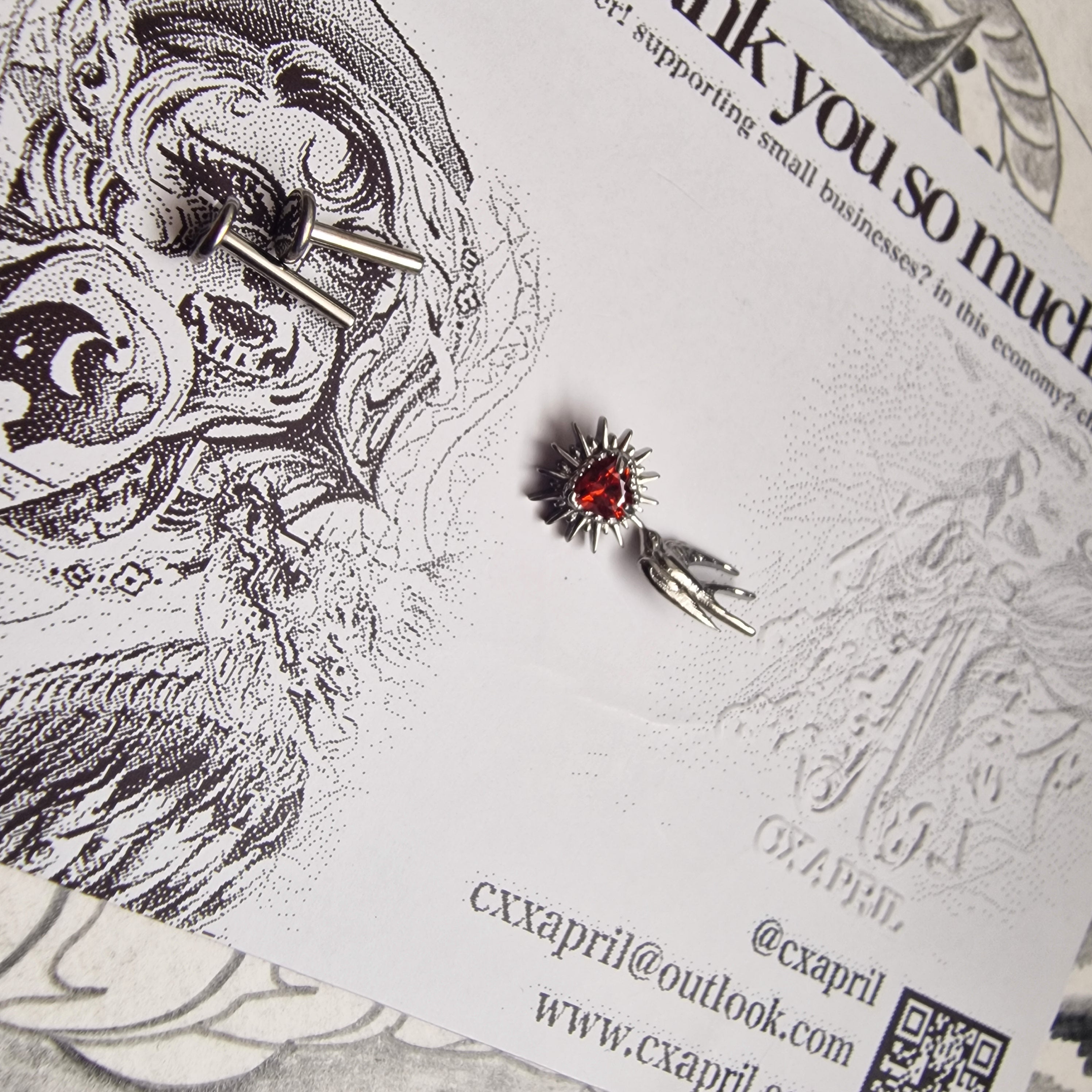 Don't shoot the messenger | Asymmetric Titanium Silver Bird Earring and Red Zircon Cartilage Stud Set
