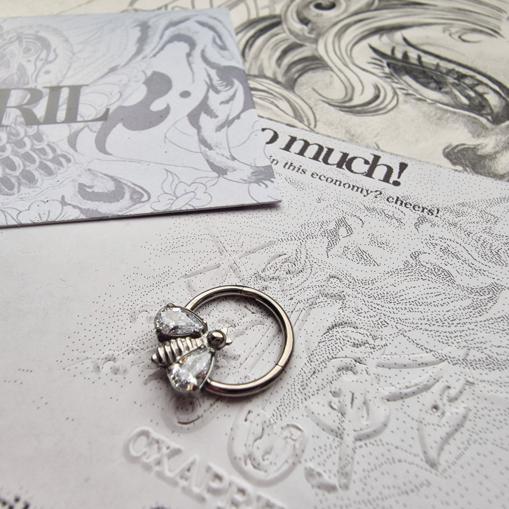 Buzzing about it! | Silver Titanium Cartilage Body Piercing