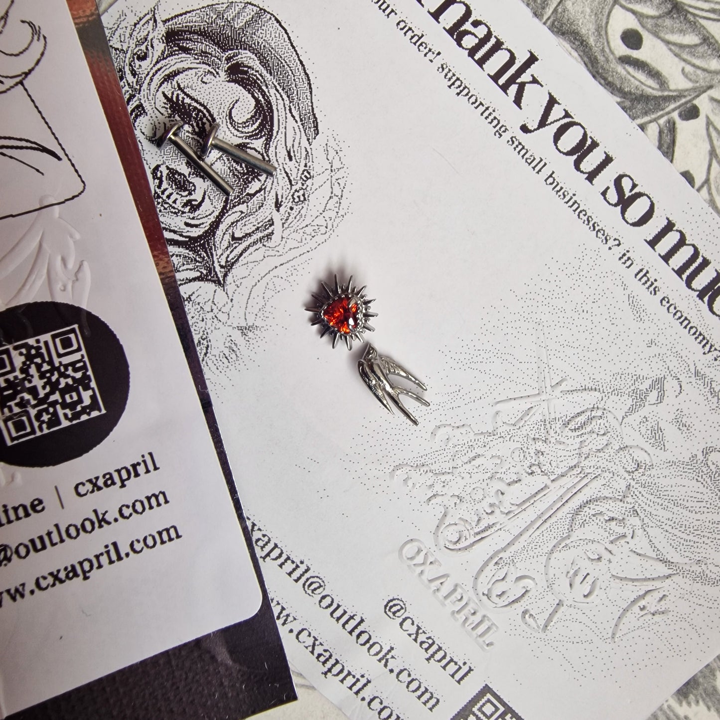 Don't shoot the messenger | Asymmetric Titanium Silver Bird Earring and Red Zircon Cartilage Stud Set