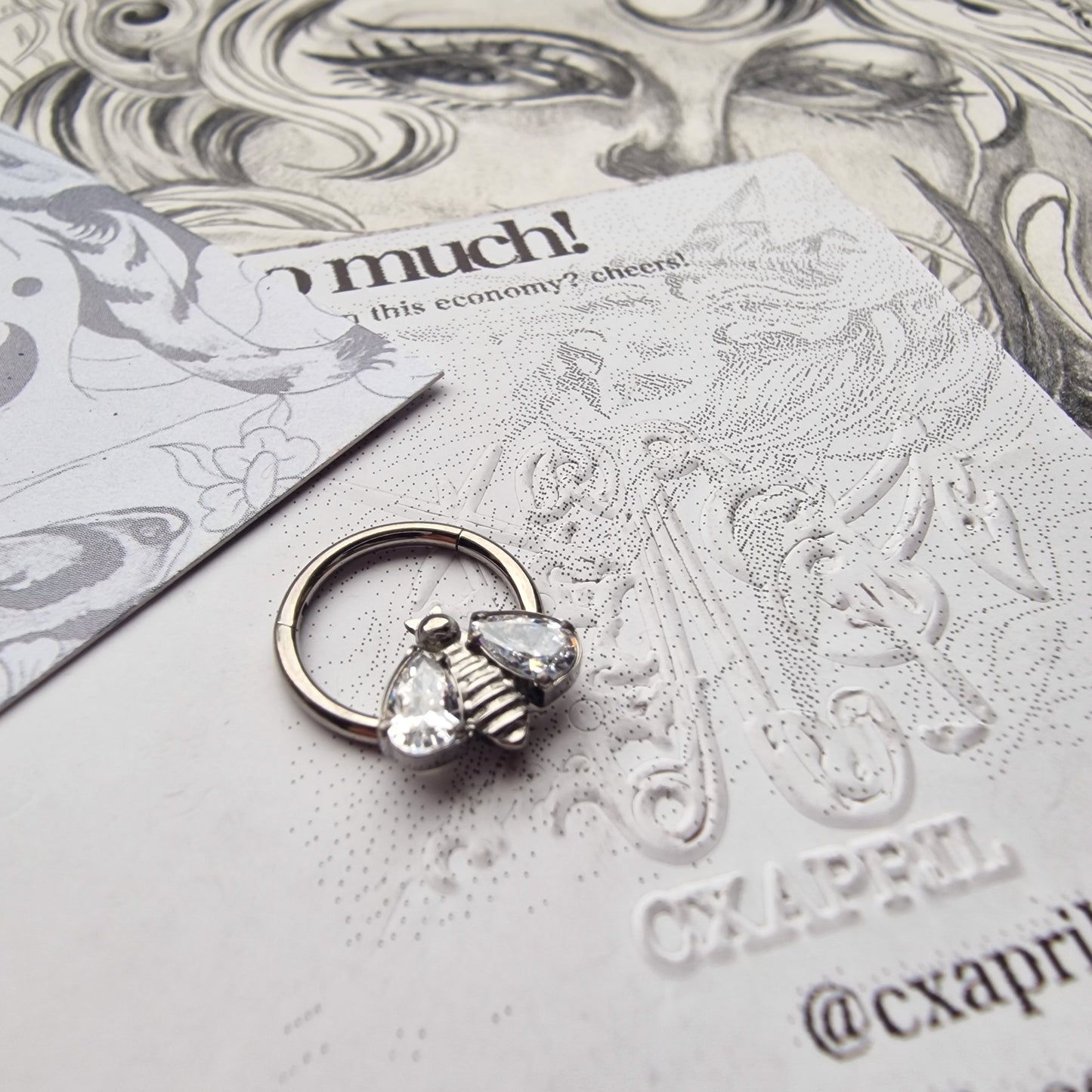 Buzzing about it! | Silver Titanium Cartilage Body Piercing